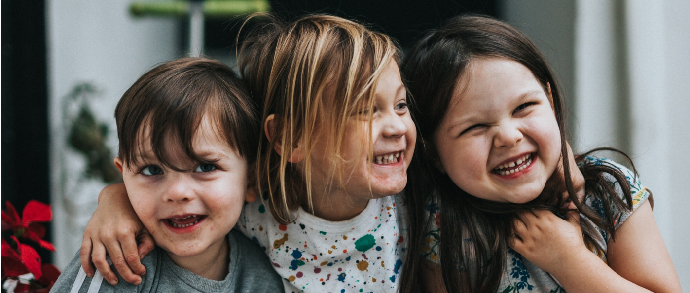 Picture of three children smiling